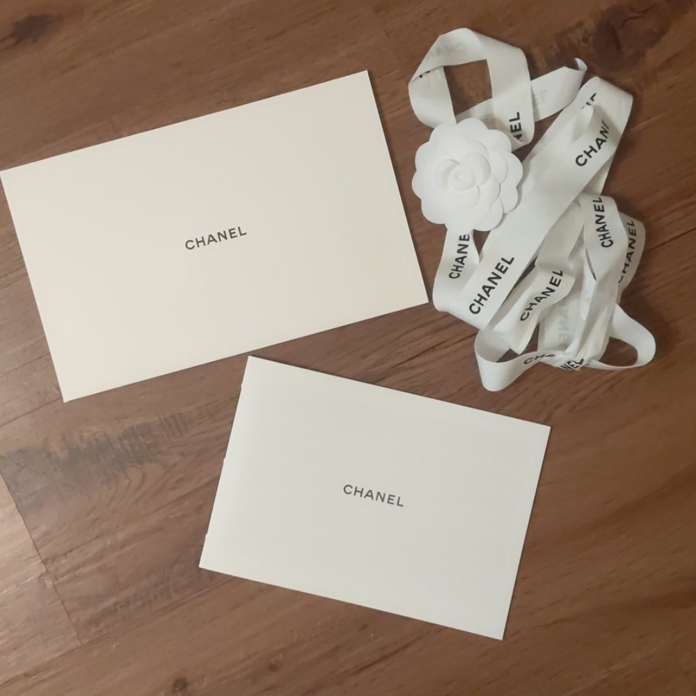 Chanel booklet and fabric tie with flower